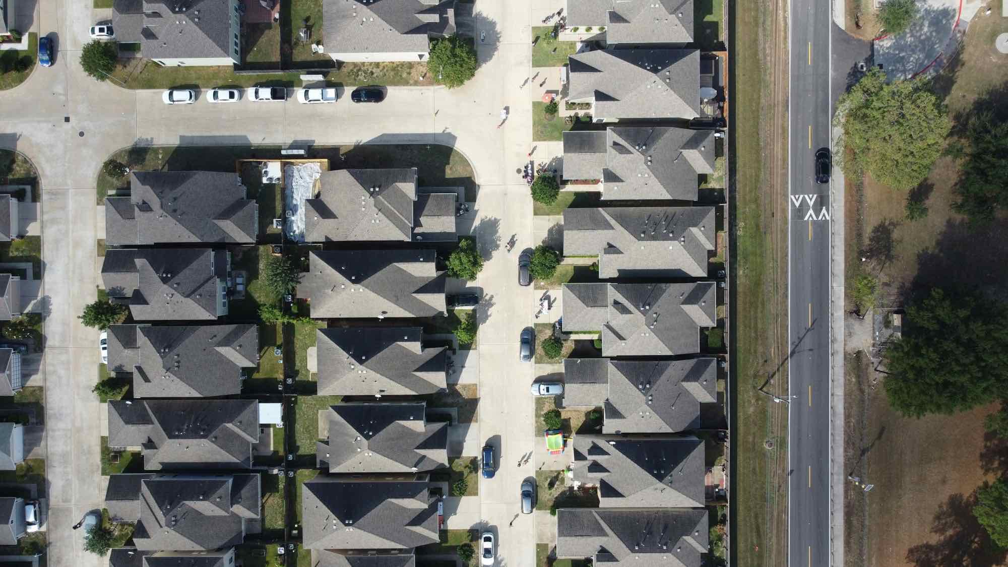 An aerial view of rows of new single-family rental homes