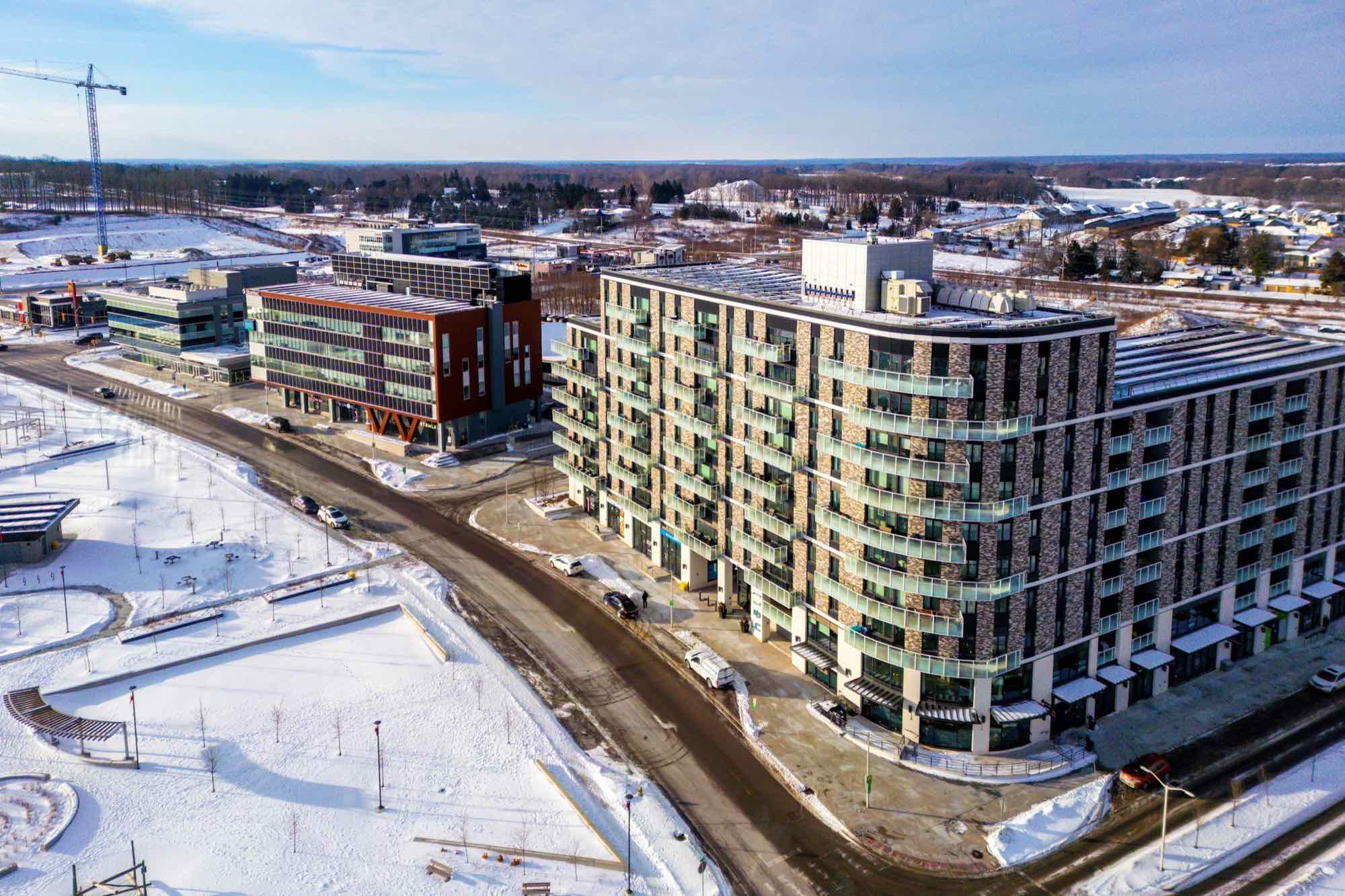 An aerial view of new mid-rise apartment buildings