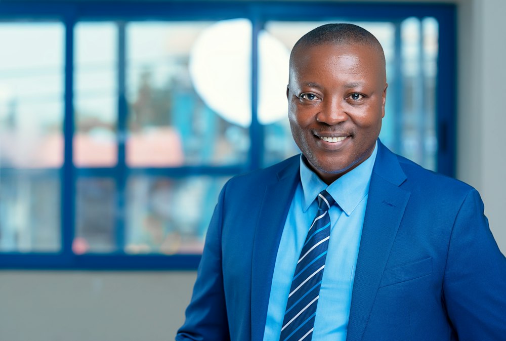 A smiling banker in a suit