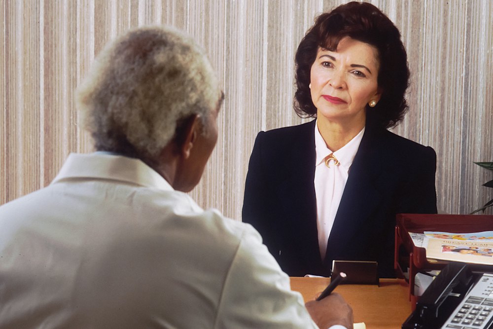 A senior banker meeting a client