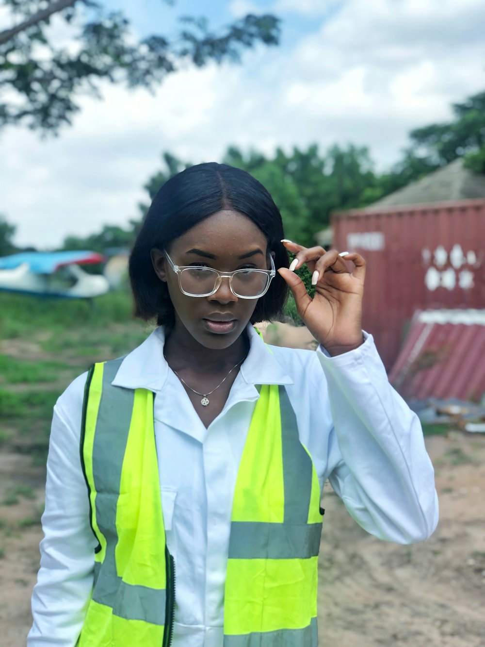 A woman in a hi-vis vest on a job site